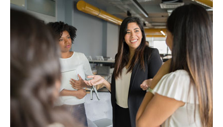 Women talking in the workplace Women talking in the workplace
